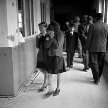 A girl cried as she walked through the corridors of School No. 1, Beslan, North Ossetia, September 2004